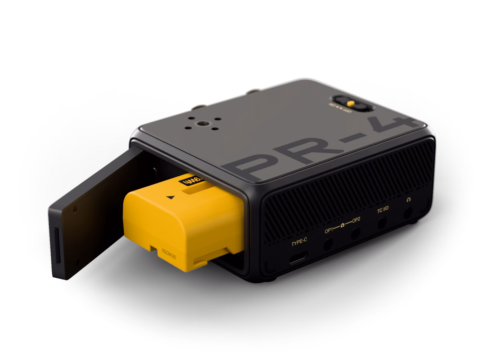 PR-4 from the back with the battery door open and the yellow Deity NP-F550 battery half out, USB-C port on the side