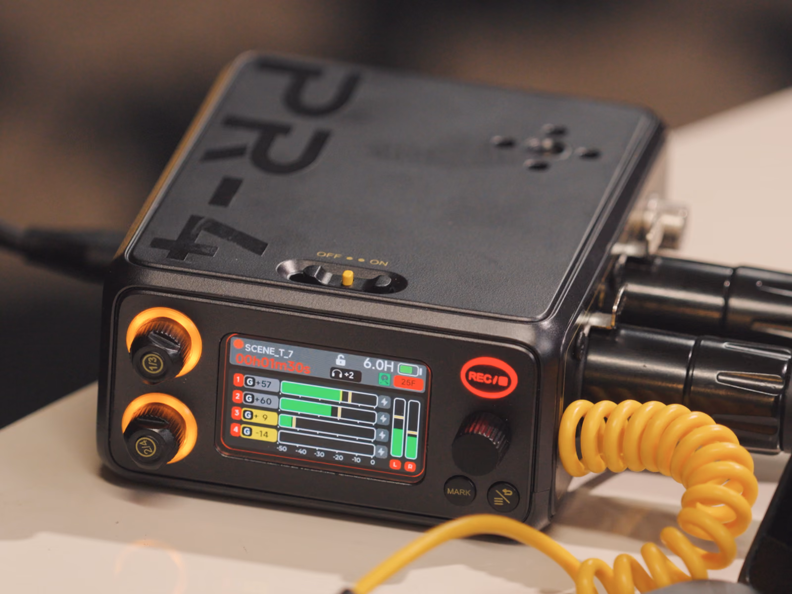 PR-4 recording on a table, top plate with its 1/4 inch mount and locating holes, XLR cables plugged in