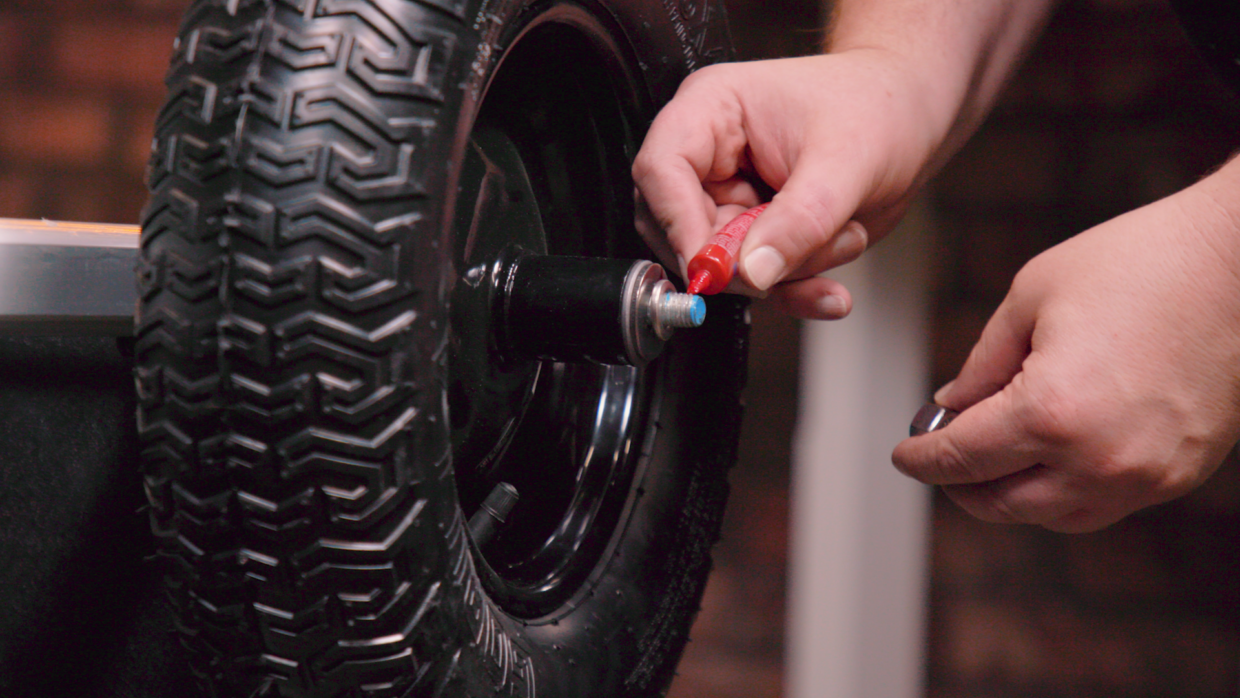 Olympia XL sound cart. Adding wheelbarrow wheels and axle. Sealing thread with red loctite