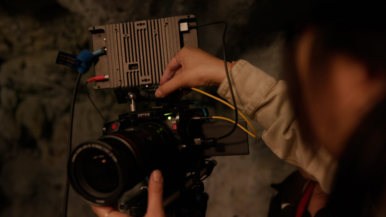 camera operator attaching Deity TC-1