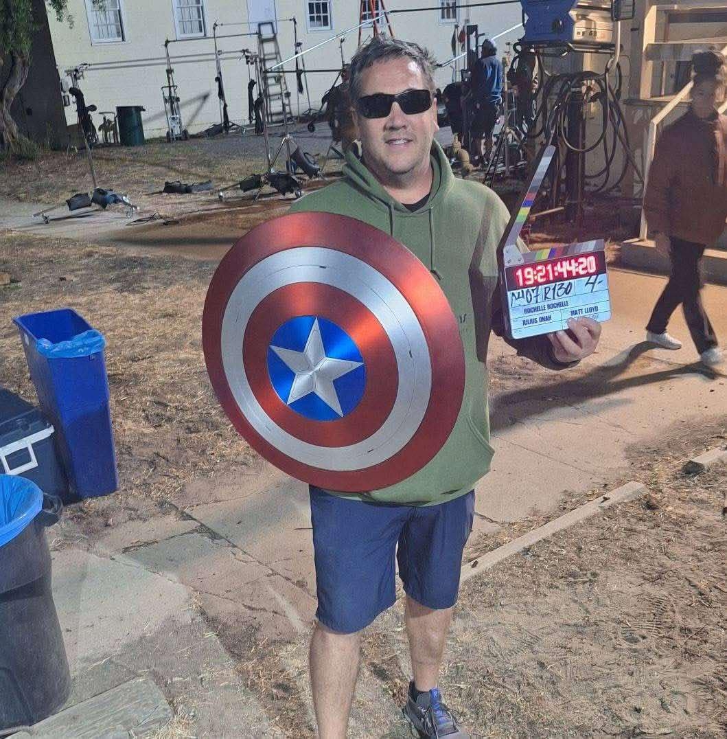 Simon Cowell holding a timecode slate=