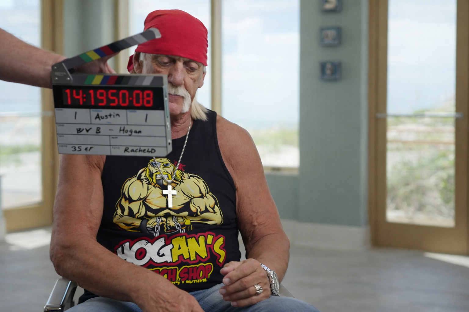 WWE legend Hulk Hogan with a timecode slate